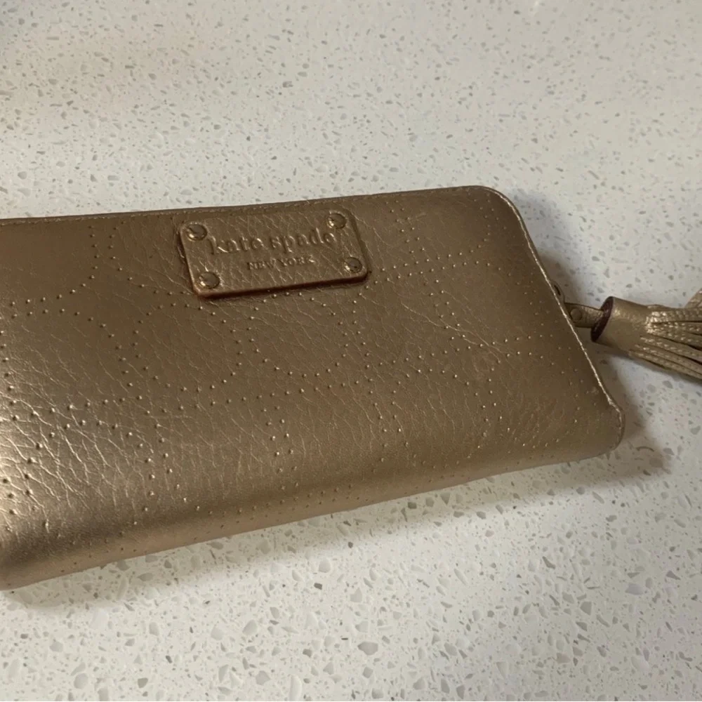 Kate Spade Metro Spade Neda Continental Zip Wallet in Gold
